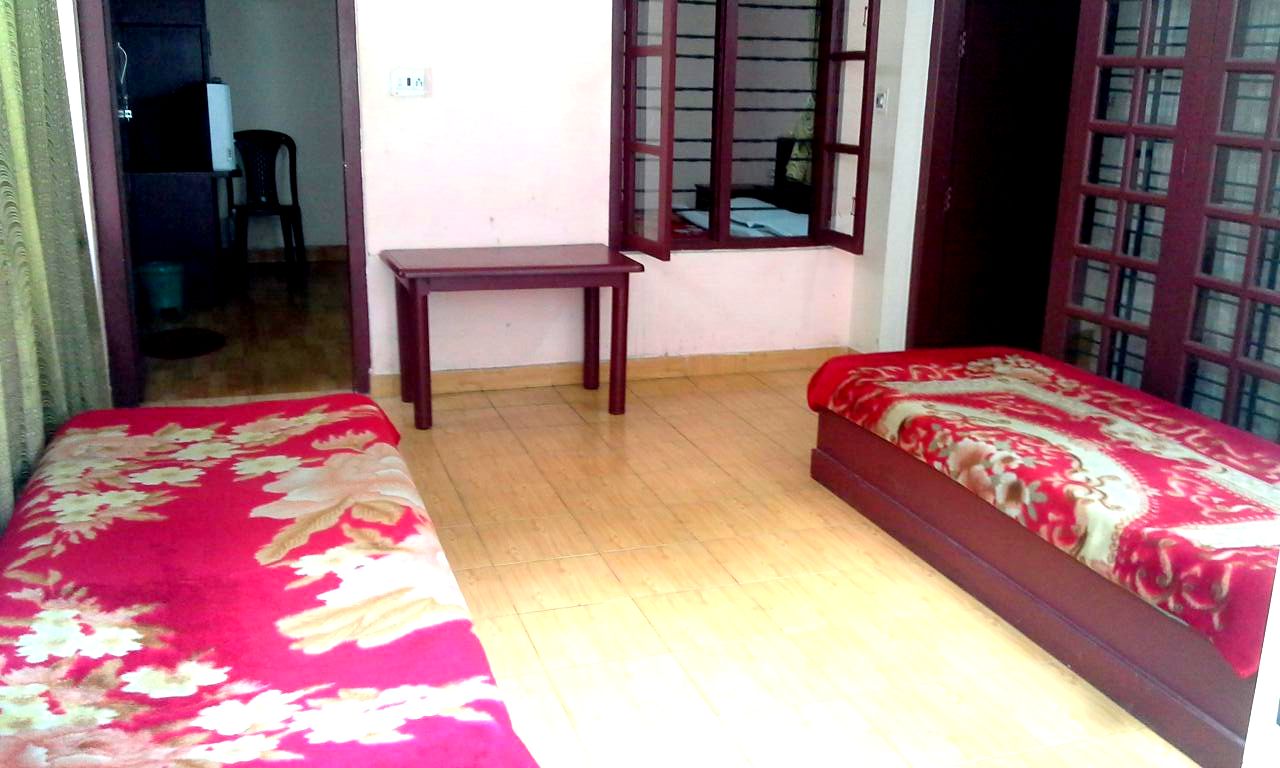 Munnar Greens Stay Cottage Bedroom